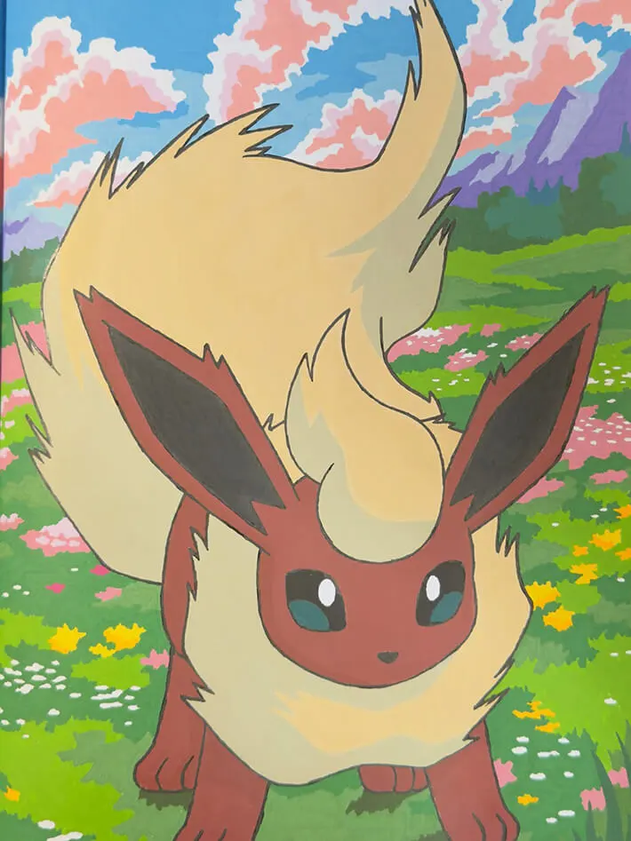 Completed Pokémon colour by numbers page 32 featuring Flareon, coloured with acrylic marker pens