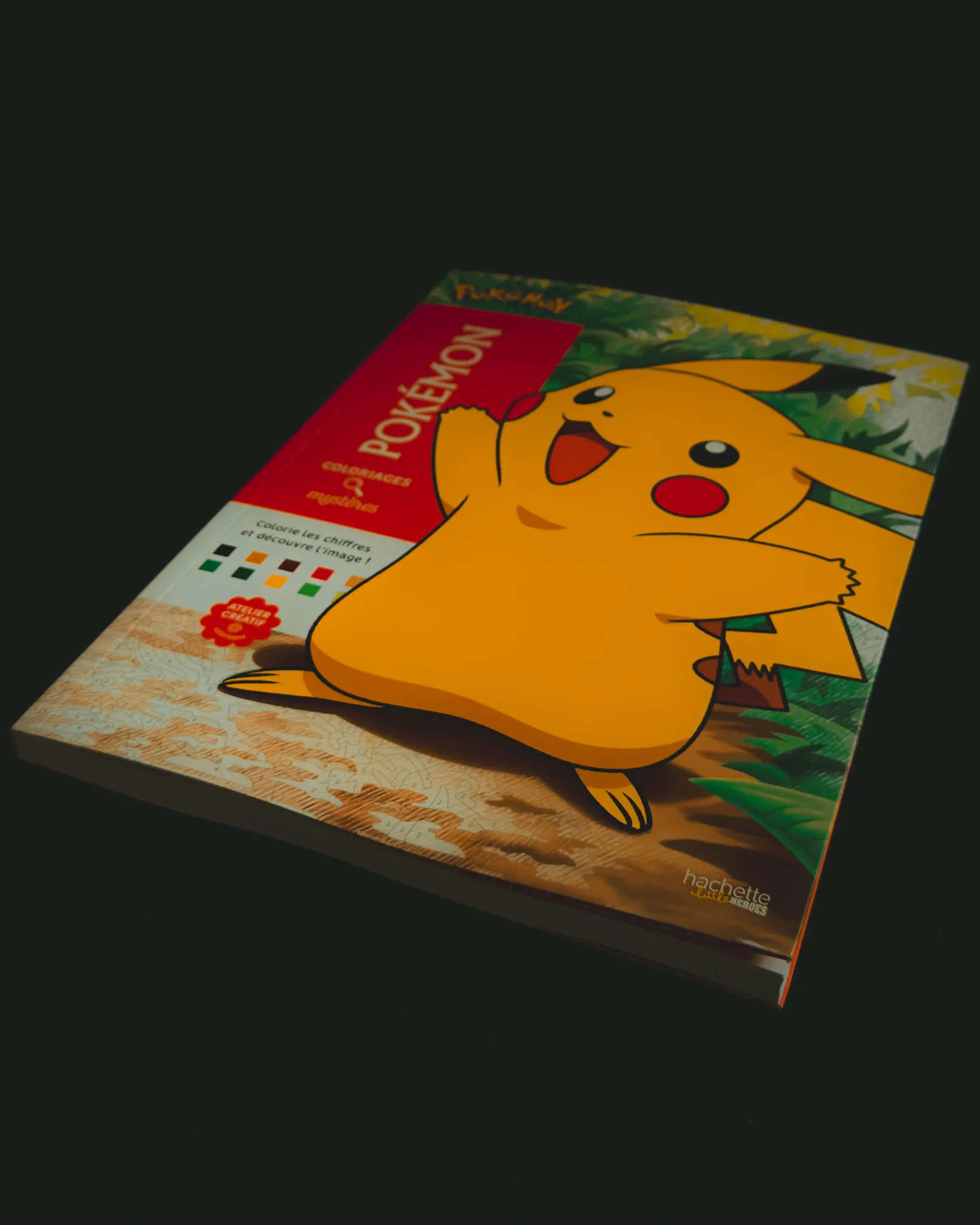 Close up of the Pokémon Colour By Numbers book by Hachette